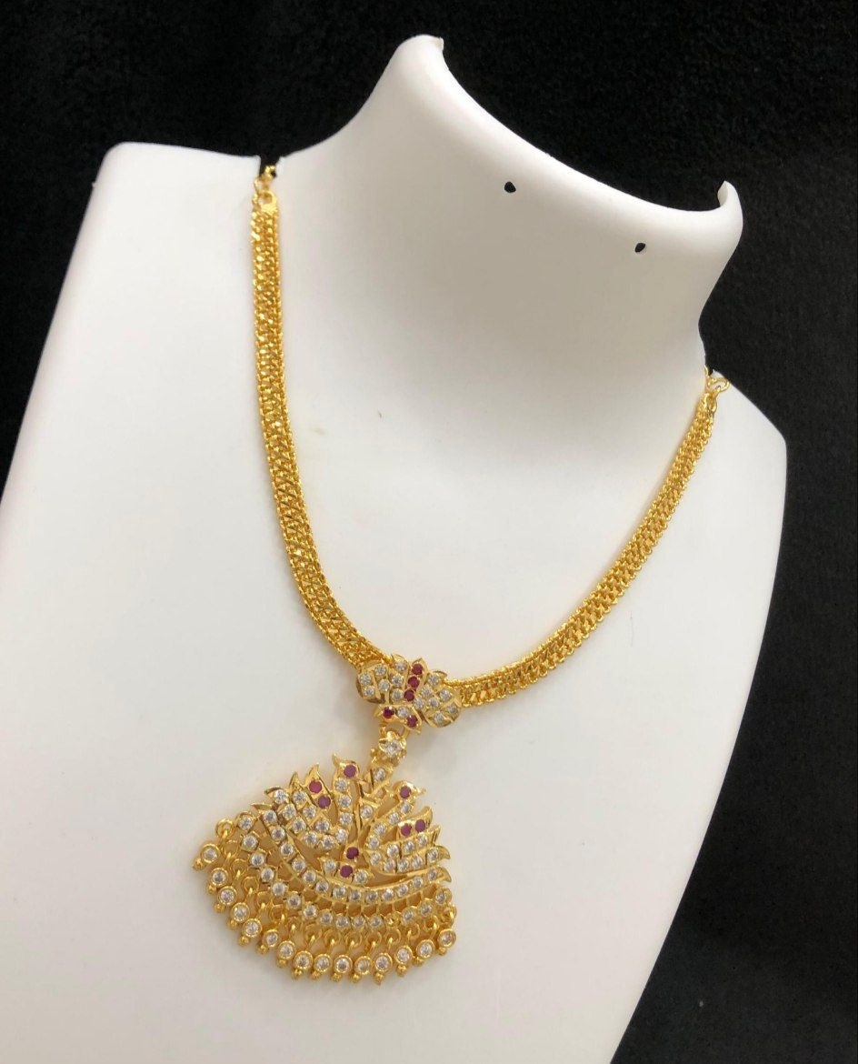 Swarna AD Stone Impon Pendant set